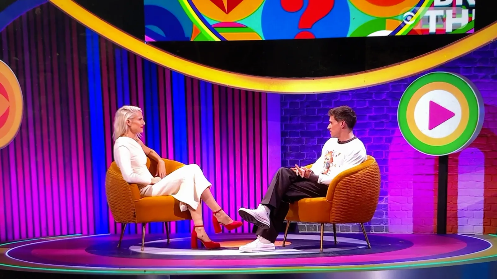 Dr Soph giving live psychology commentary in the Big Brother studio